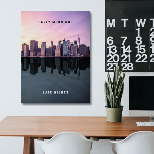Motivational wall art with sunrise city skyline, water reflection and “Early Mornings – Late Nights” quote.