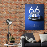Motivational wall art with a blue Shelby ’66 fastback in front of a brick wall in a living room