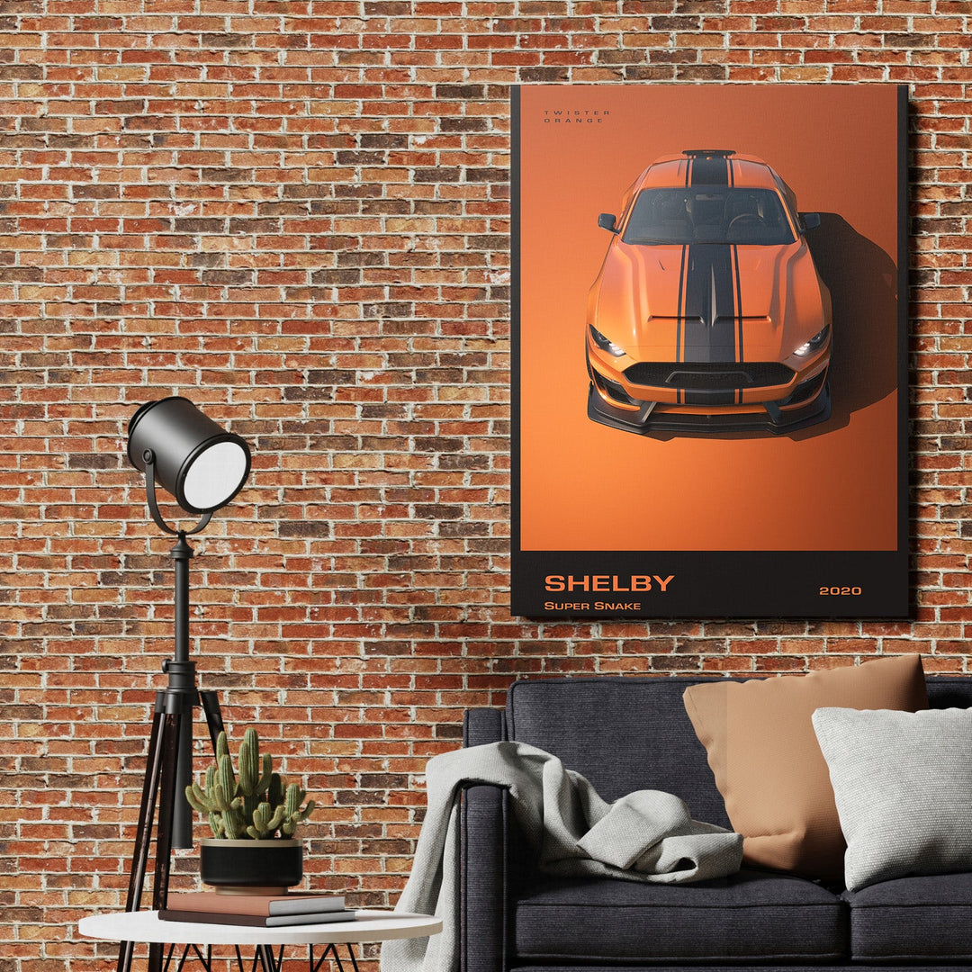 Motivational wall art with an orange Shelby sports car on a brick wall in an industrial living room