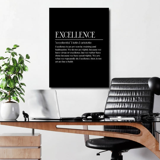 Motivational wall art with a white Aristotle quote on a black canvas in a modern office