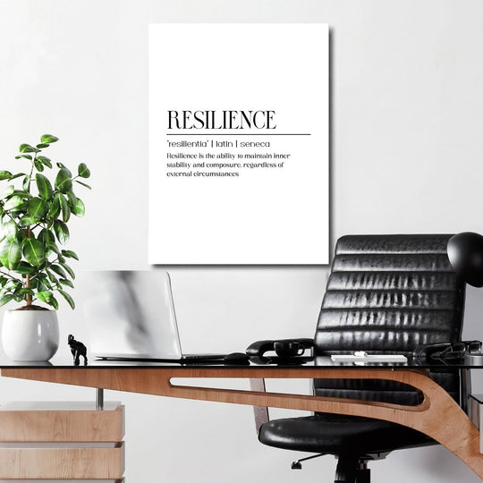 Motivational canvas print in an office with a minimalist RESILIENCE title and a Seneca quote
