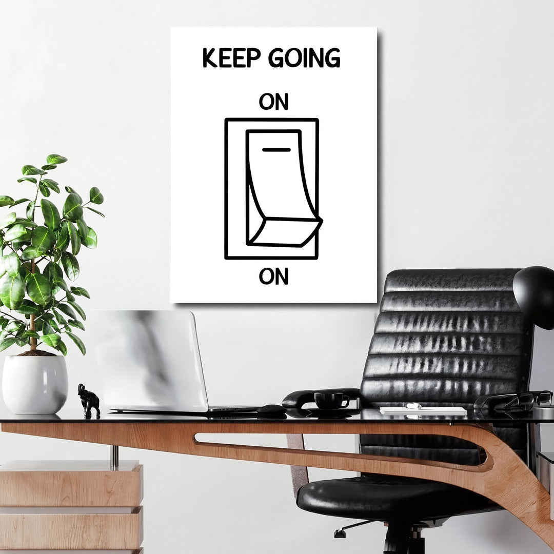 Keep Going On motivational wall art with a minimalist power switch icon in a modern office