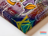 Corner detail of pop art canvas wall art with graffiti lines, dollar bills and a duck foot.