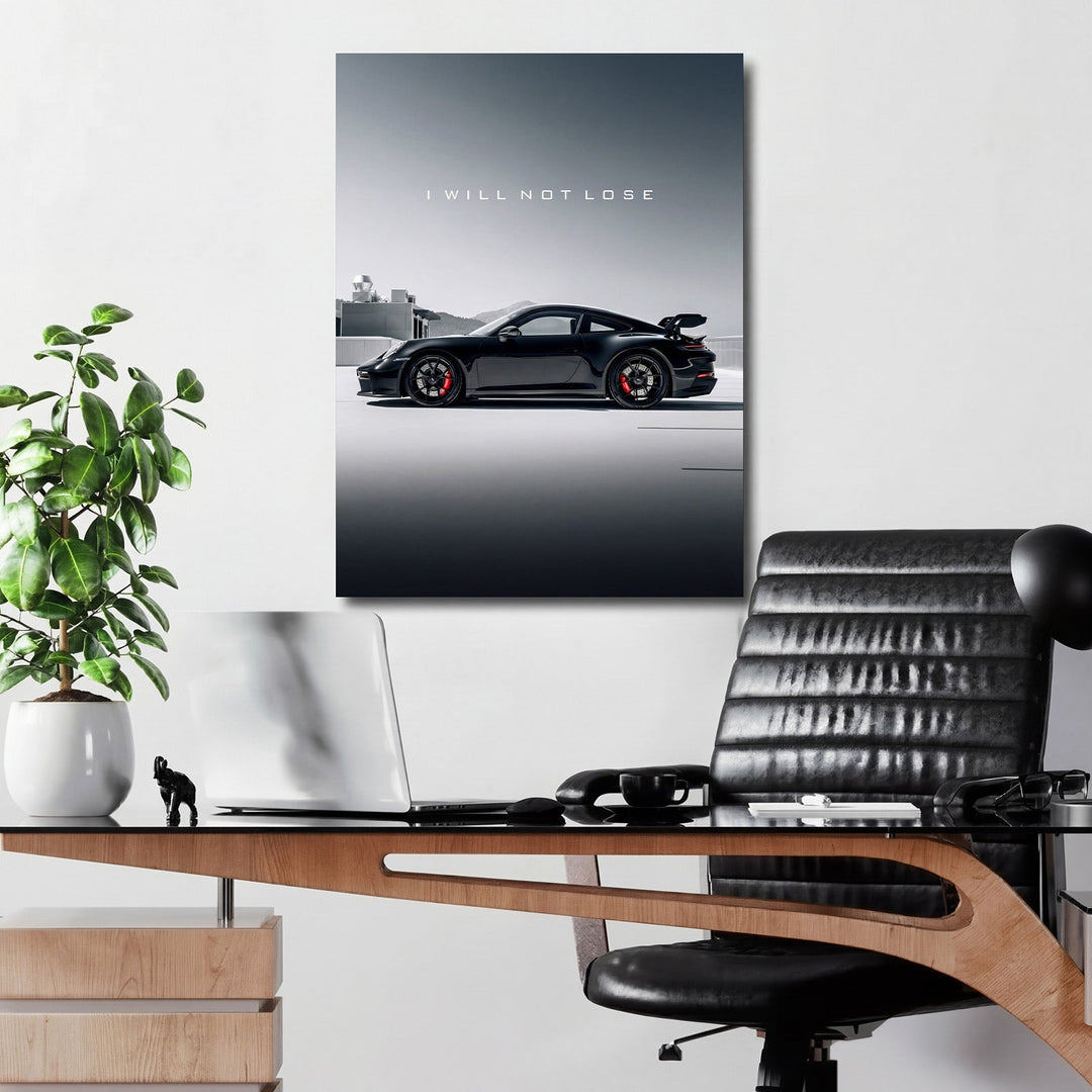 Motivational wall art with black sports car and text I WILL NOT LOSE in a modern office