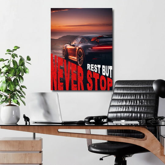Motivational canvas print with a luxury sports car at sunset and a bold performance quote for an office
