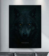 Motivational canvas wall art with a minimalist wolf portrait and piercing eyes in a modern living room.