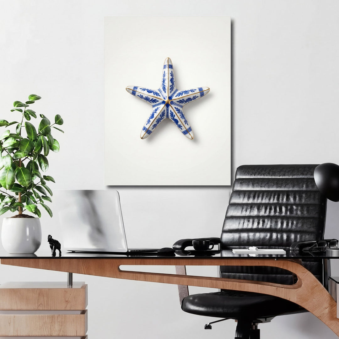 Modern wall art with a blue-and-white porcelain starfish hanging above a desk in an office