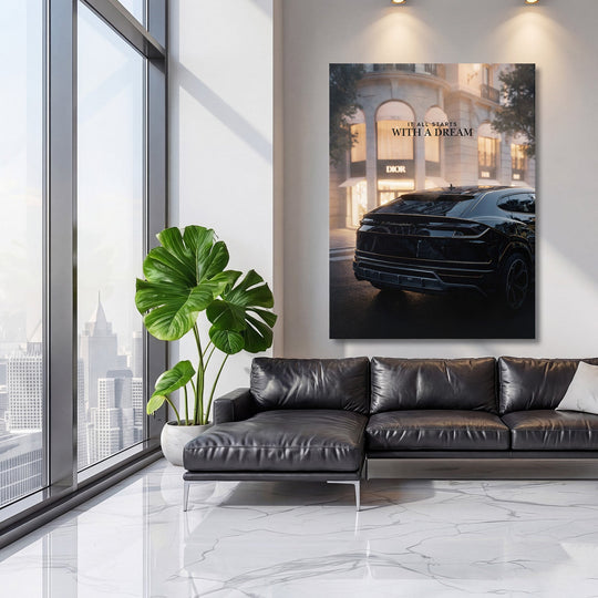 Motivational canvas print with a black Lamborghini in front of a luxury boutique in a modern living room
