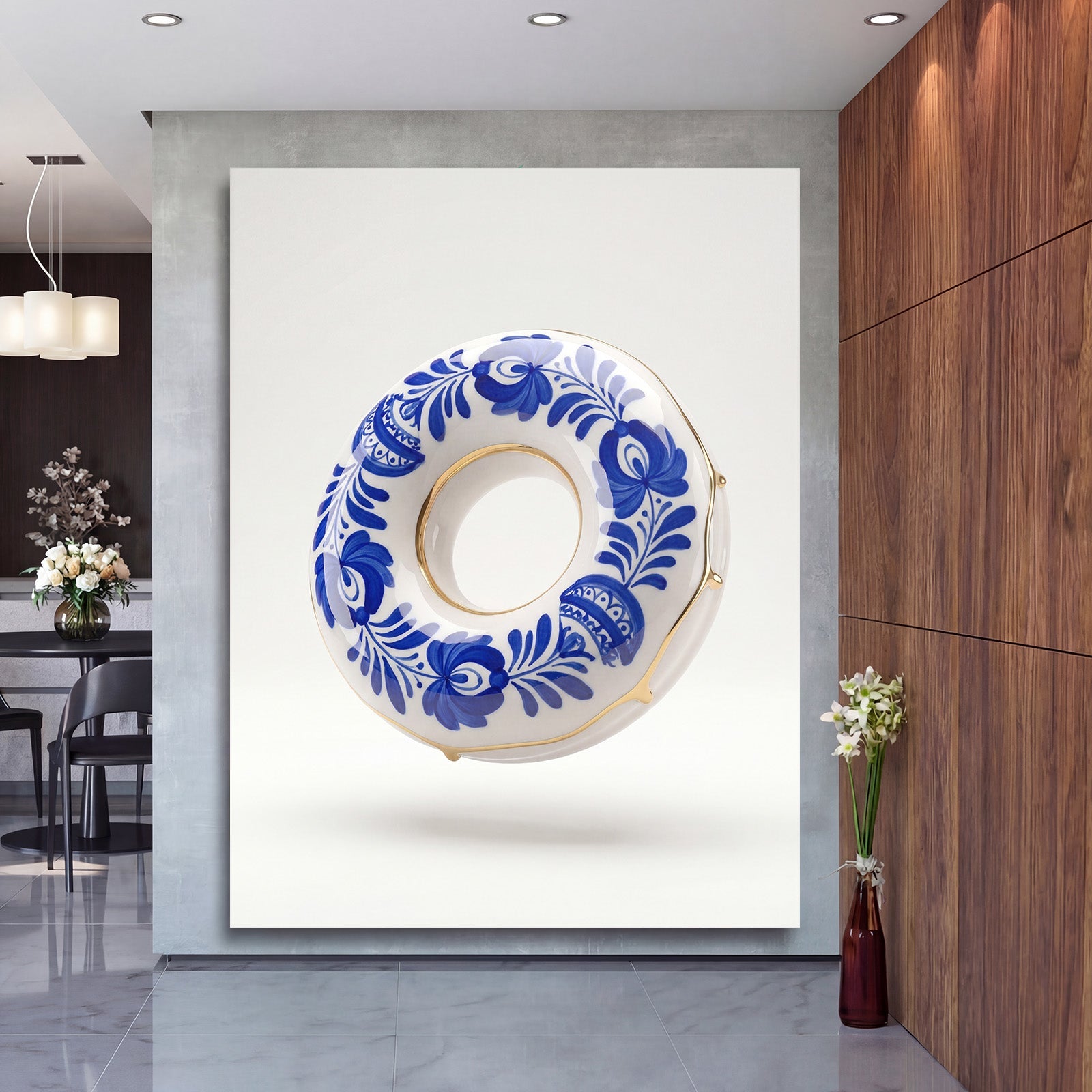 Motivational wall art with a blue-and-white porcelain donut and gold accents in a living room