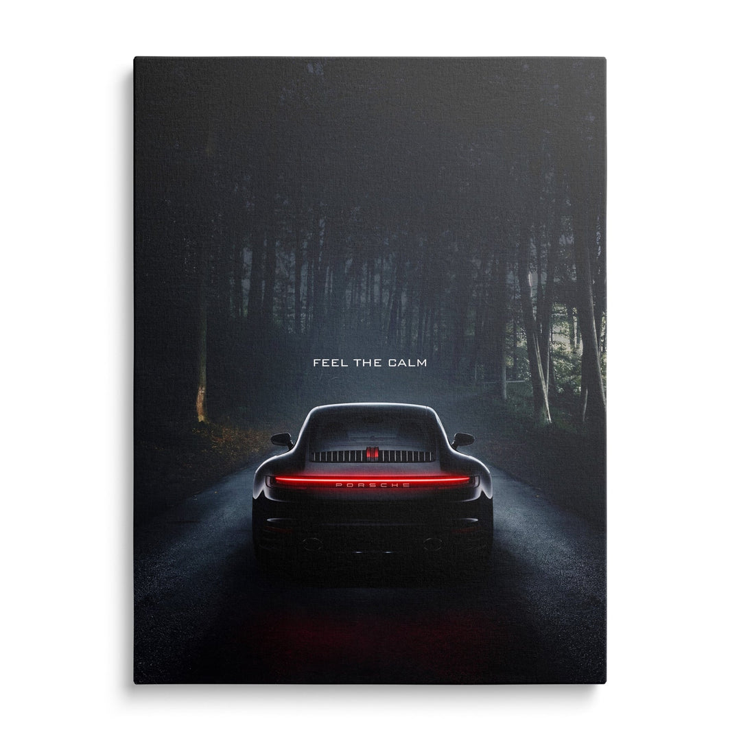 Luxury canvas wall art with black Porsche front view on quiet forest road, minimalist carmotife motif