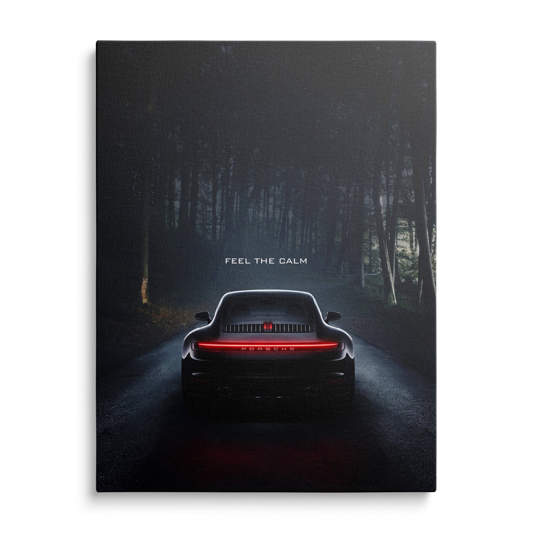 Luxury canvas wall art with black Porsche front view on quiet forest road, minimalist carmotife motif