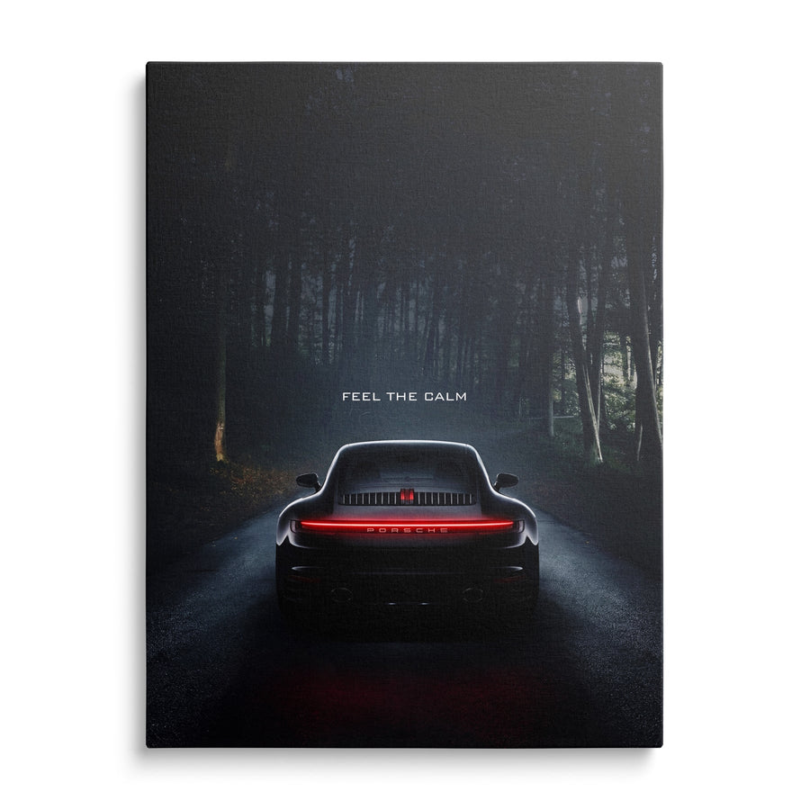 Luxury canvas wall art with black Porsche front view on quiet forest road, minimalist carmotife motif
