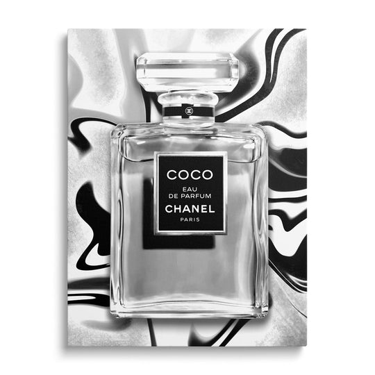 Coco Chanel modern canvas wall art displayed on a wall.