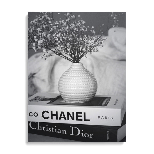 Luxury canvas print with black and white Chanel and Christian Dior book spines
