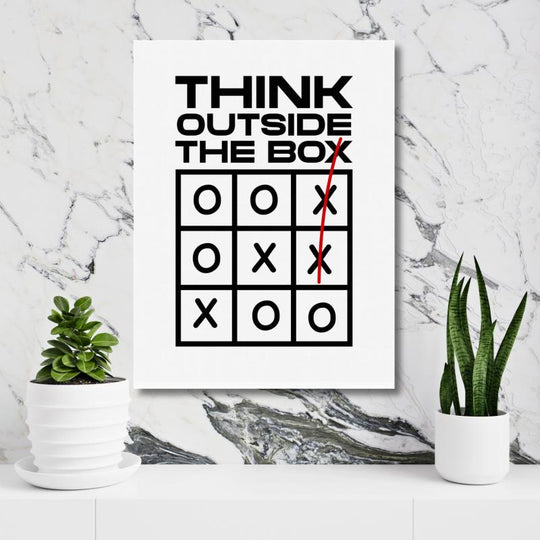 “THINK OUTSIDE THE BOX” motivational quote wall art with a tic-tac-toe design, an inspiring poster print by Mindset Walls.