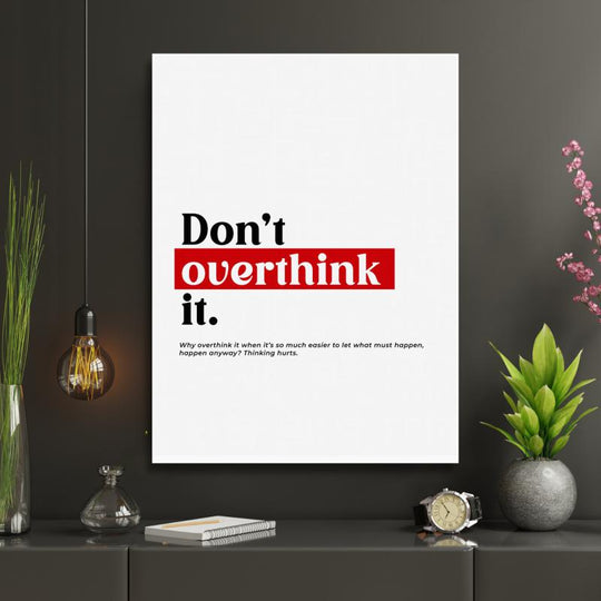 “Don’t Overthink It” motivational poster as minimalist wall art in a modern interior.