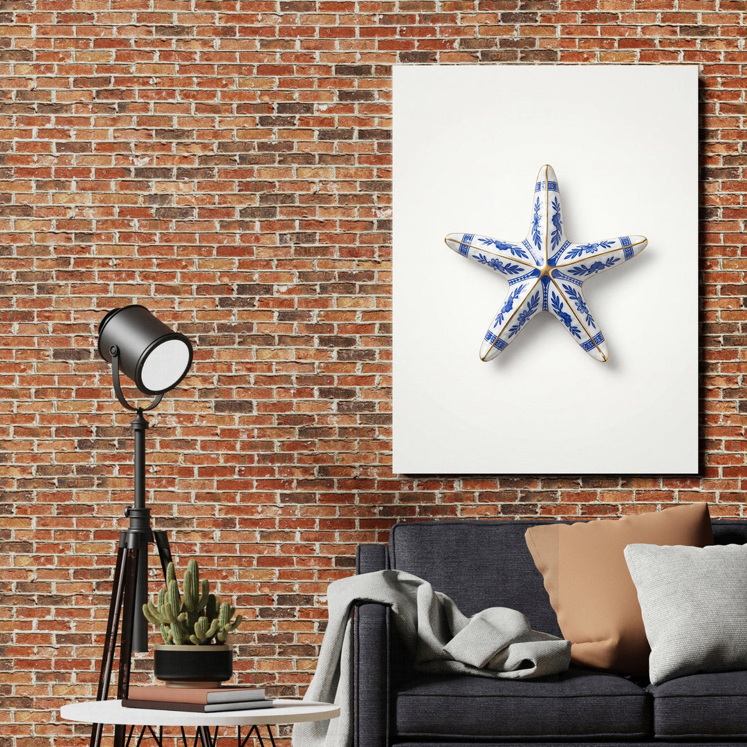 Modern canvas print with a blue porcelain starfish and nautical motif on a brick wall
