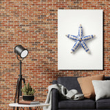 Modern canvas print with a blue porcelain starfish and nautical motif on a brick wall