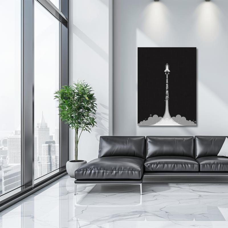Motivational canvas wall art with a minimalist rocket in a modern living room with a black sofa.