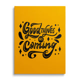 Motivational canvas print with the black phrase “Good things are coming” on a yellow background, front view