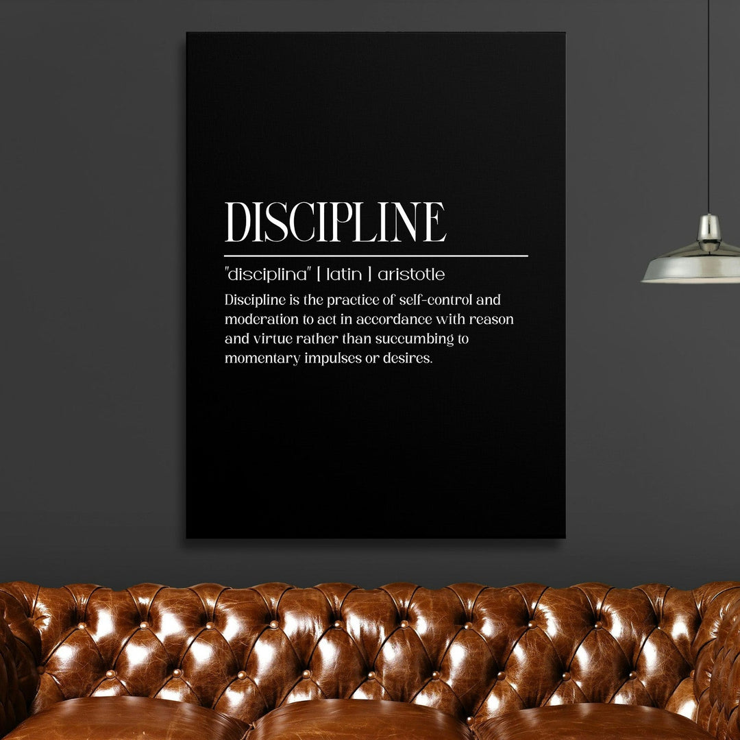 Discipline motivational canvas wall art above a brown leather sofa and ceiling lamp in a modern interior