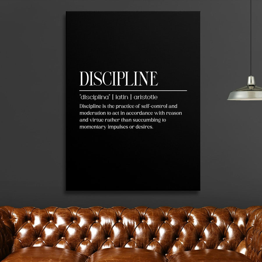 Discipline motivational canvas wall art above a brown leather sofa and ceiling lamp in a modern interior