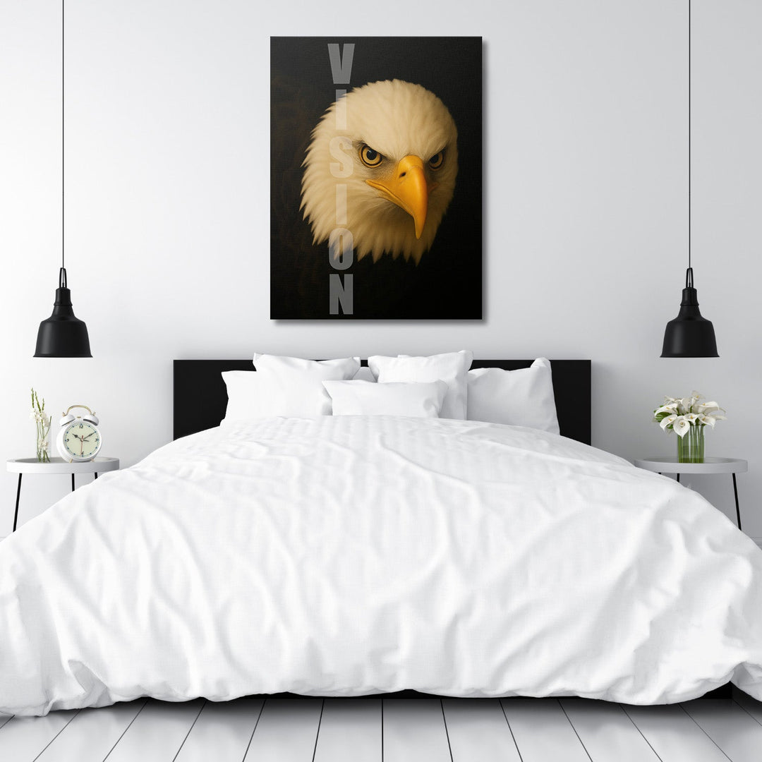 Motivational canvas wall art with an eagle and VISION text hanging in a minimalist bedroom.