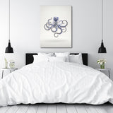 Modern canvas print with a blue-and-white porcelain octopus above a bed in a minimalist bedroom