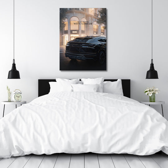 Motivational canvas print: black SUV in front of a Dior boutique, quote “It All Starts With a Dream” in a bedroom