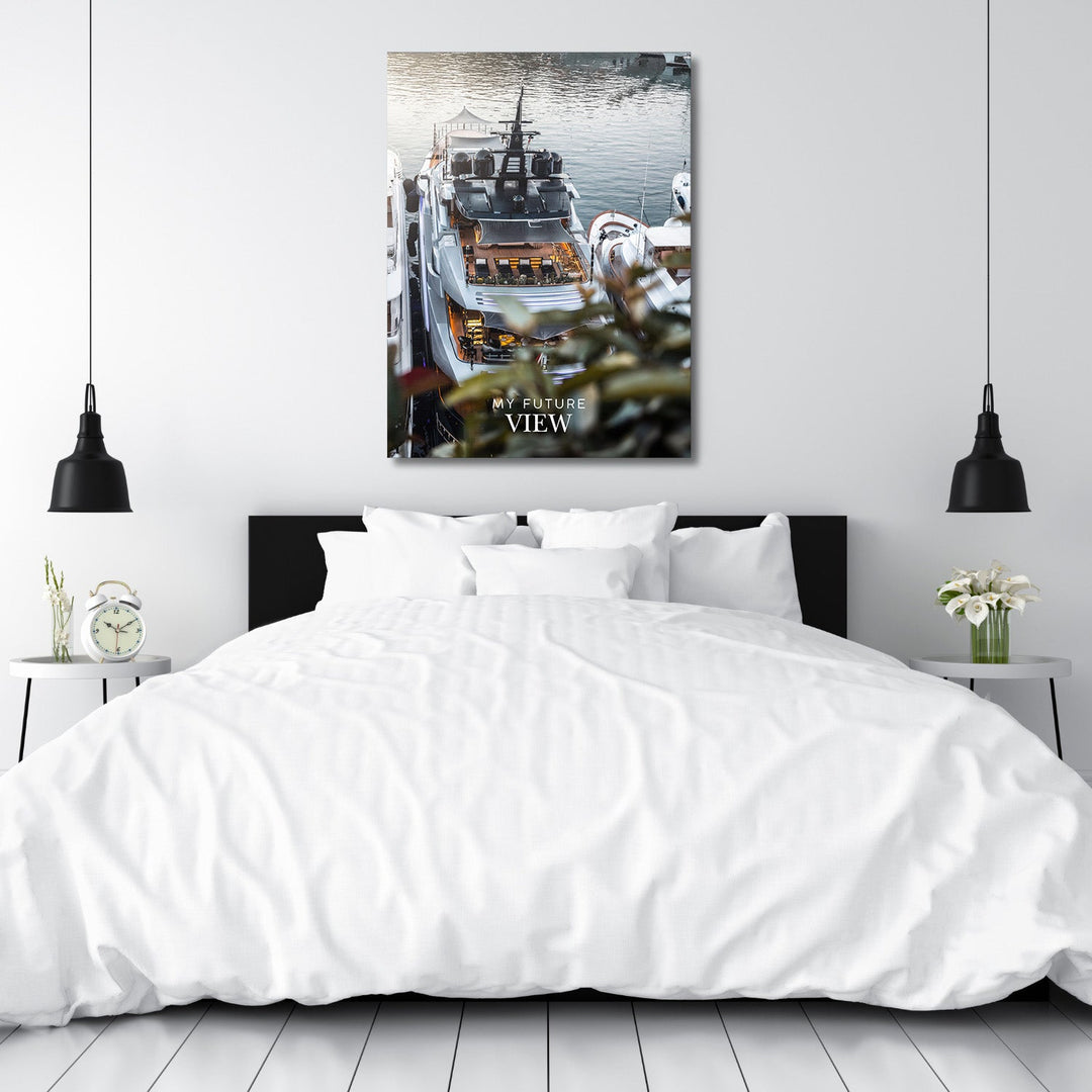 Motivational canvas print with a luxury yacht and the text “My Future View” above a bed in a minimalist bedroom