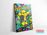 Motivational canvas wall art with a graffiti teddy bear wearing glasses, a gold chain and a dollar sign in pop art style.