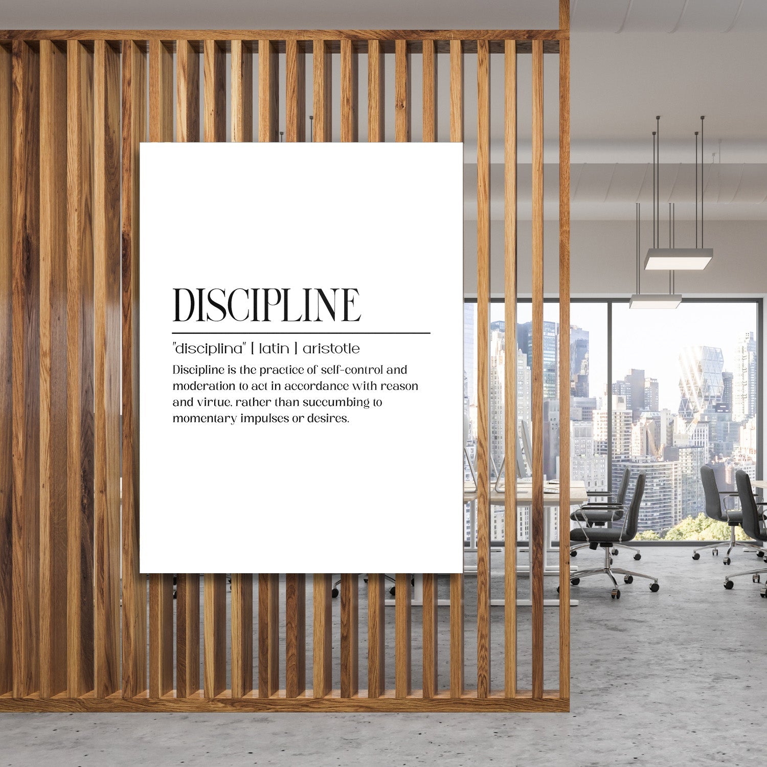 DISCIPLINE motivational canvas wall art with an Aristotle definition hanging in a modern office by a wooden partition