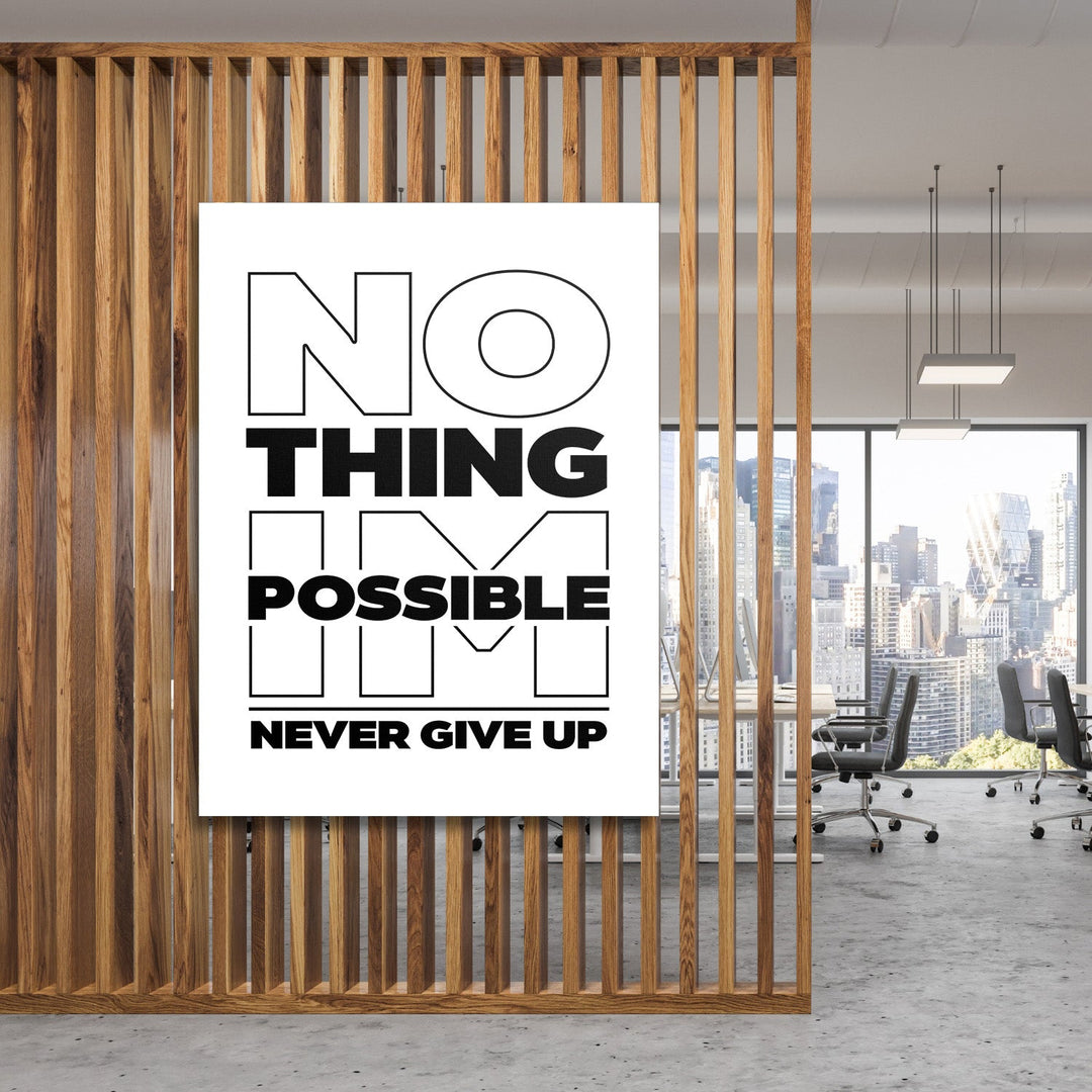 Black and white No Thing Is Possible Never Give Up motivational wall art in a modern office with a city view