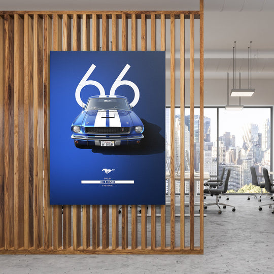 Motivational canvas wall art with a blue Ford Mustang GT350 number 66 hanging on a wooden partition in a modern office