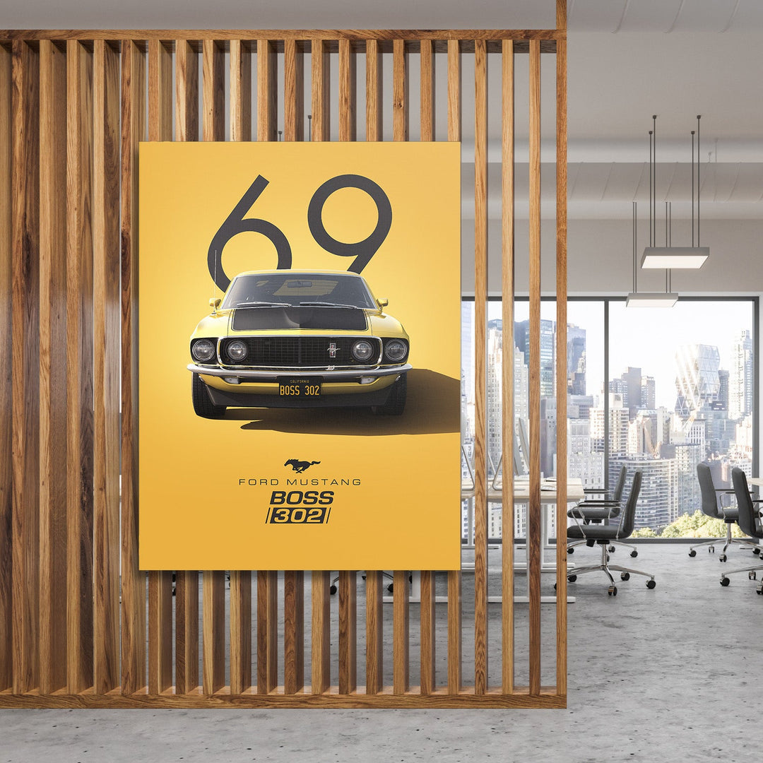 Motivational canvas wall art with a yellow Ford Mustang Boss 302 number 69 hanging in a modern office