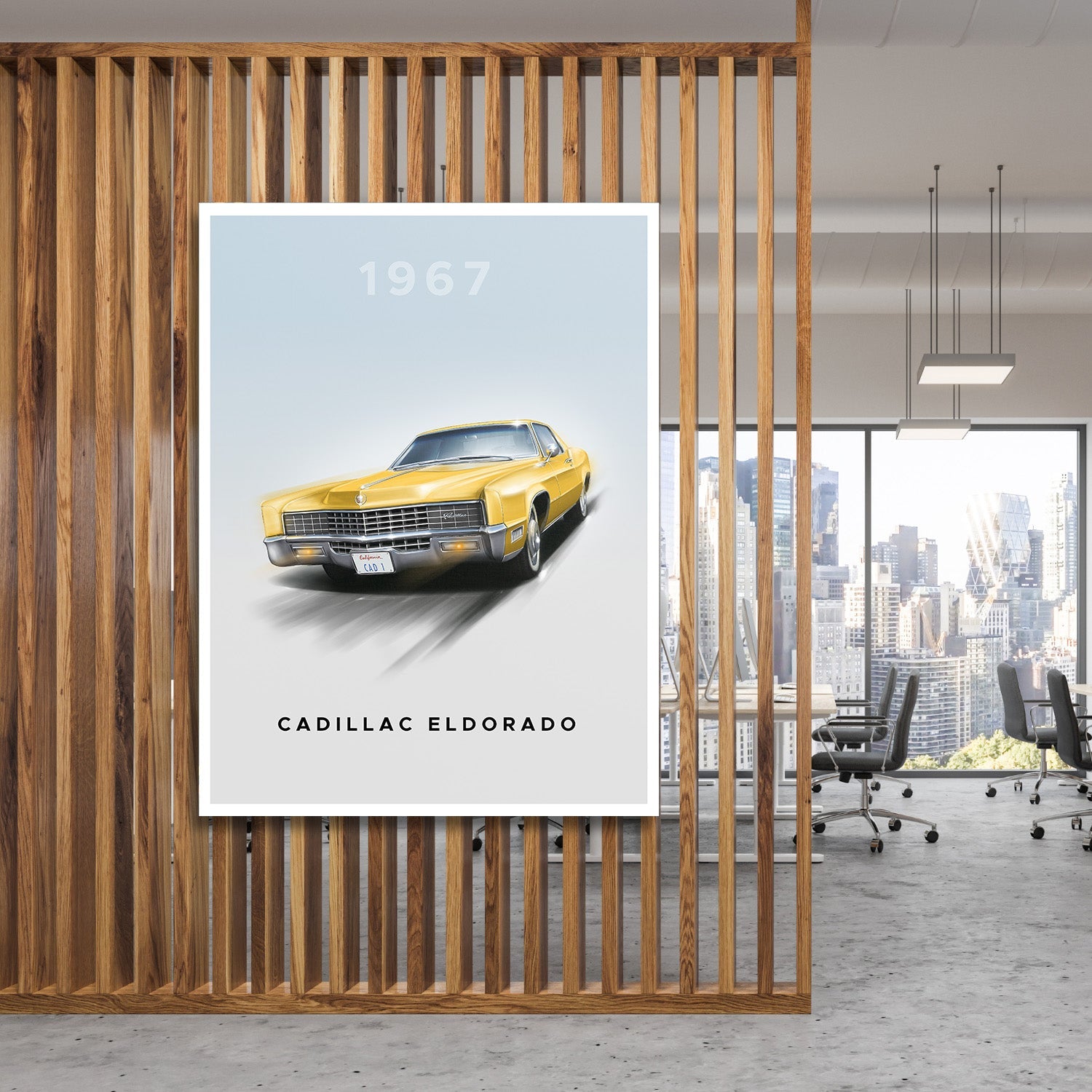 Motivational canvas wall art with a yellow 1967 Cadillac Eldorado hanging behind wooden slats in an office