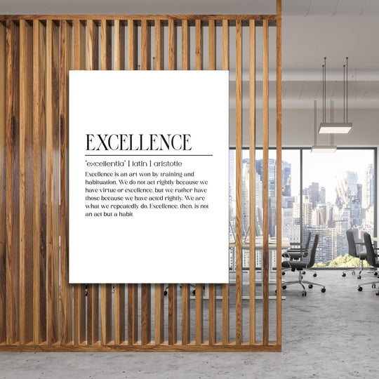 Excellence motivational canvas wall art with a black and white quote and city scene, hanging on a wooden office partition