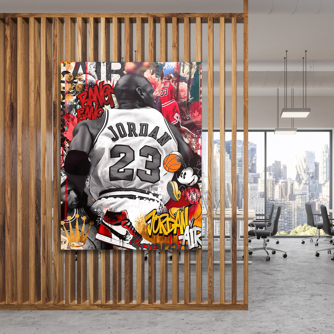 Motivational pop art wall art of Michael Jordan with a street art collage, displayed in a modern office.