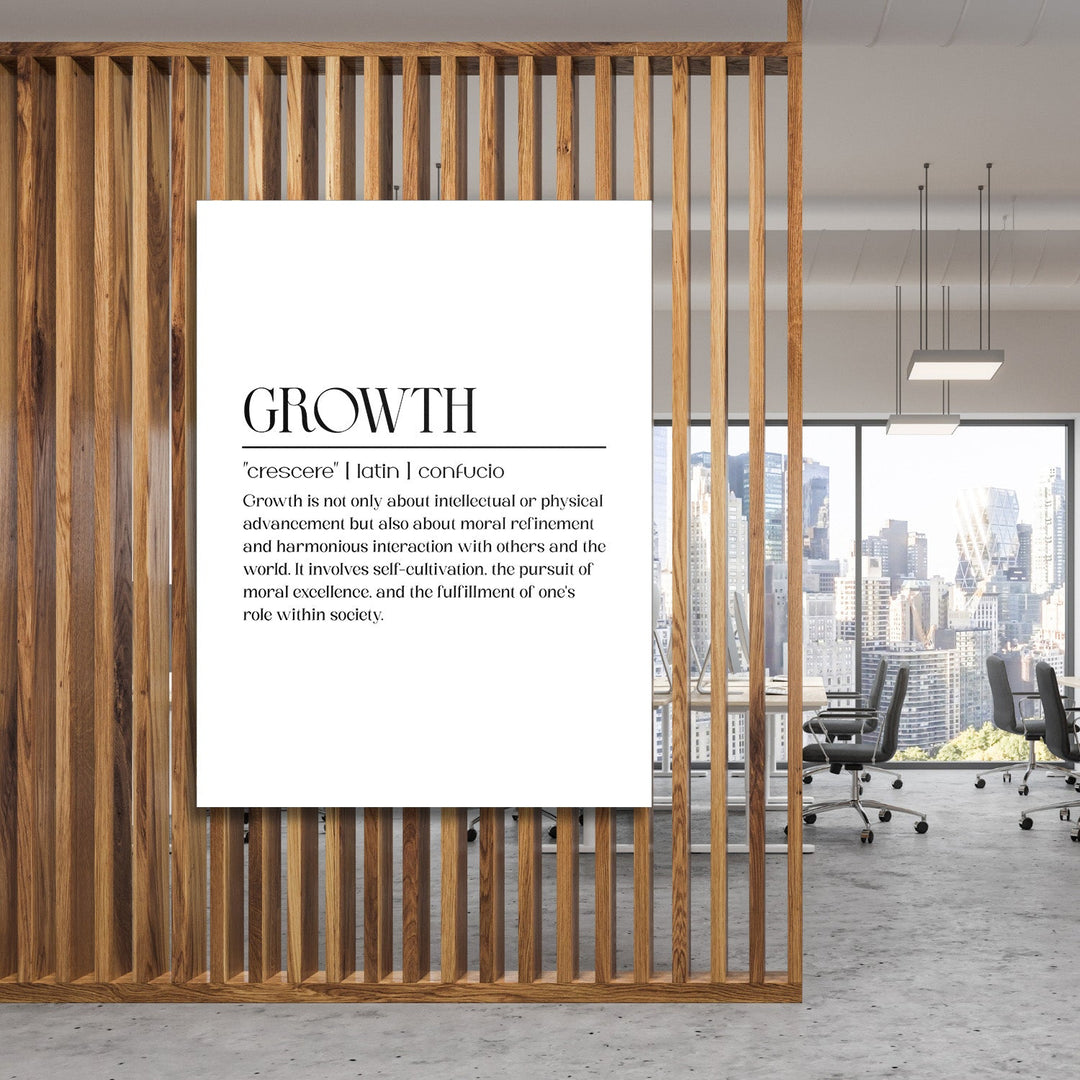 Growth motivational canvas wall art in front of wooden slats and a city panorama in a modern office