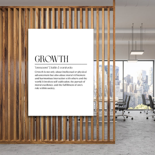 Growth motivational canvas wall art in front of wooden slats and a city panorama in a modern office