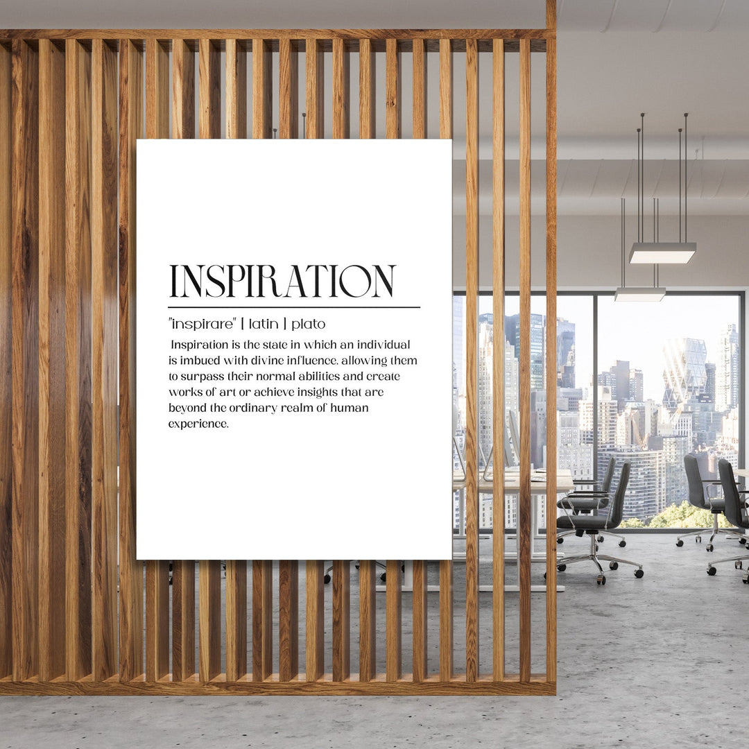 Motivational canvas wall art with a minimalist quote in a modern office behind wooden slats