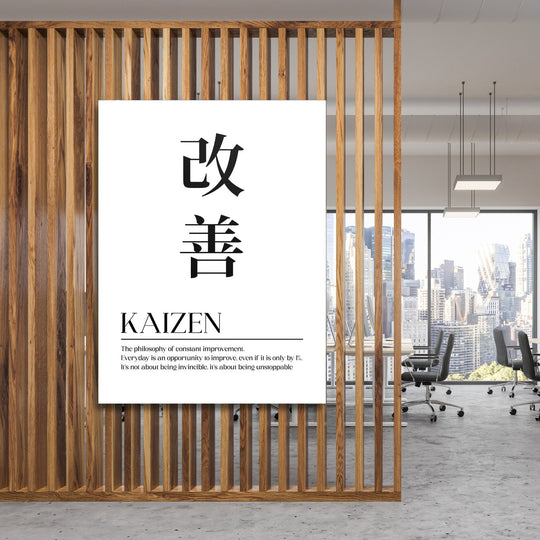 Kaizen motivational canvas print with Japanese kanji, hanging on a wooden slat wall in a modern office