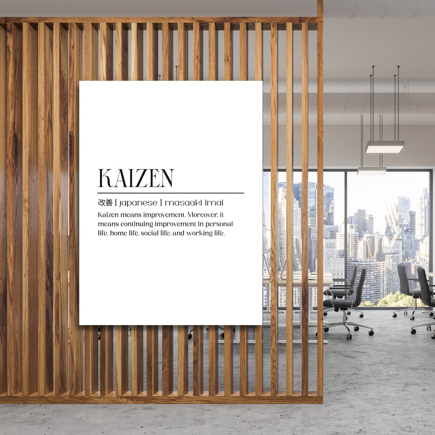 Kaizen motivational canvas wall art hanging on a wooden partition in an office with a city skyline view