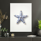 Motivational wall art with a blue-and-white porcelain-style starfish in a modern office