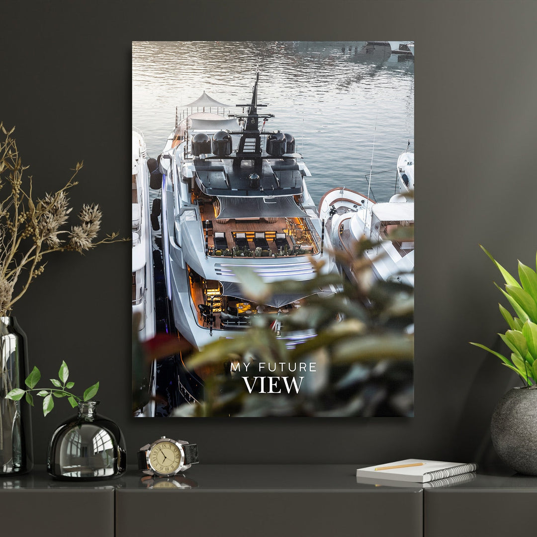Motivational wall art with a luxury yacht from a bird’s-eye view and the text “My Future View” in a modern office