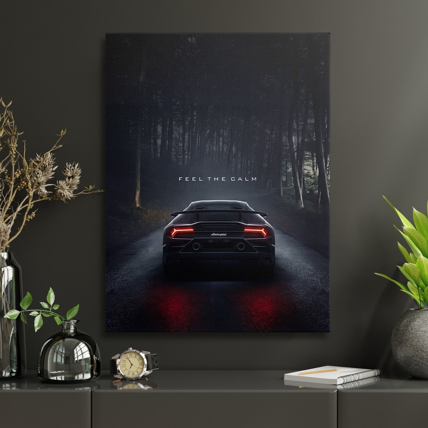 Motivational canvas print with a luxury sports car on a forest road and the quote “Feel the Calm”