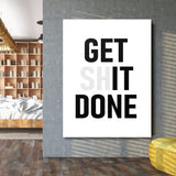 GET SHIT DONE motivational canvas print in black and white in an industrial living room