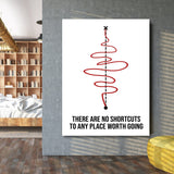 Motivational wall art in a living room with a minimalist red spiral, dotted axis and quote about the journey