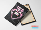 Pop art canvas wall art with a pink heart-shaped perfume bottle shown from the front and back.
