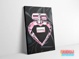 Luxury canvas wall art with pink perfume in a crystal bottle on black satin.